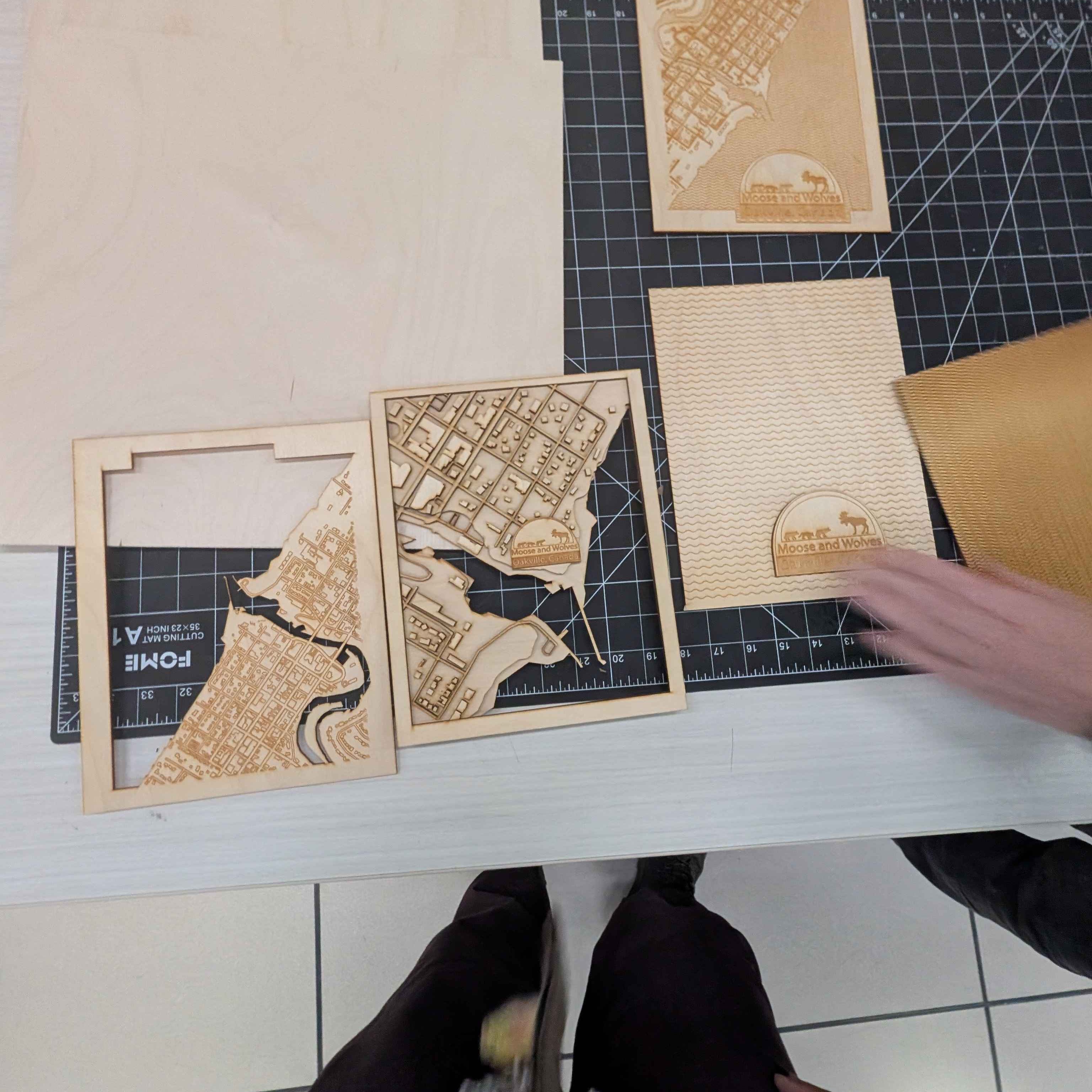 Right before we were told to experiment with the laser cutter, yhe class were provided examples of the final result for this upcoming project. I was mostly intrigued by how many layers a laser cutter can create. Some of the final models had many layers and utilized the different settings accordingly Such as representing water through cutting out the body of water, or they had created a 3D effect by stacking the different layers.