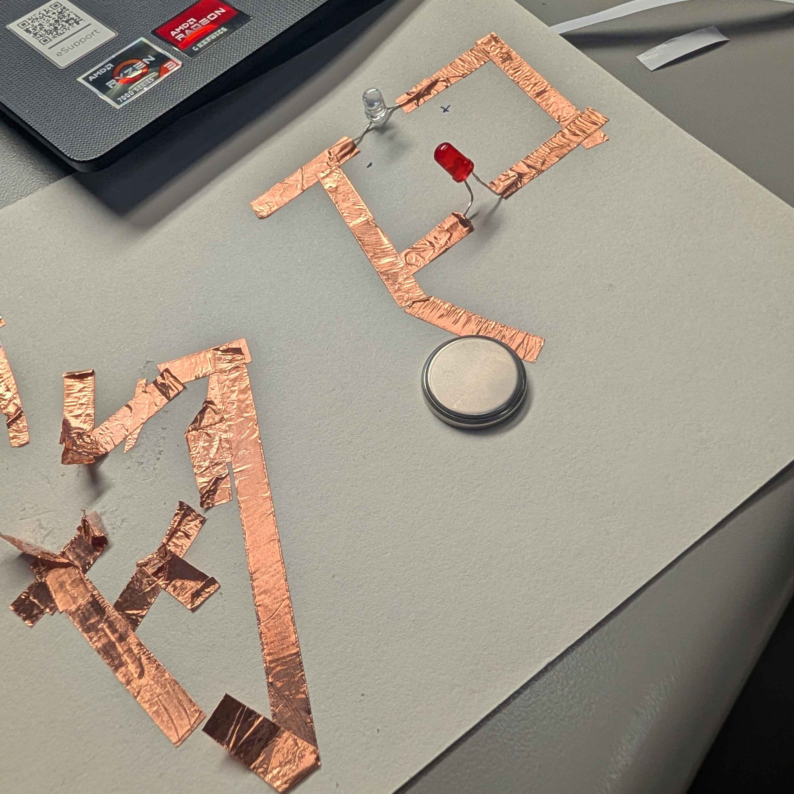 Zoomed out picture of my first board of copper tape circuts I made during the assignment.