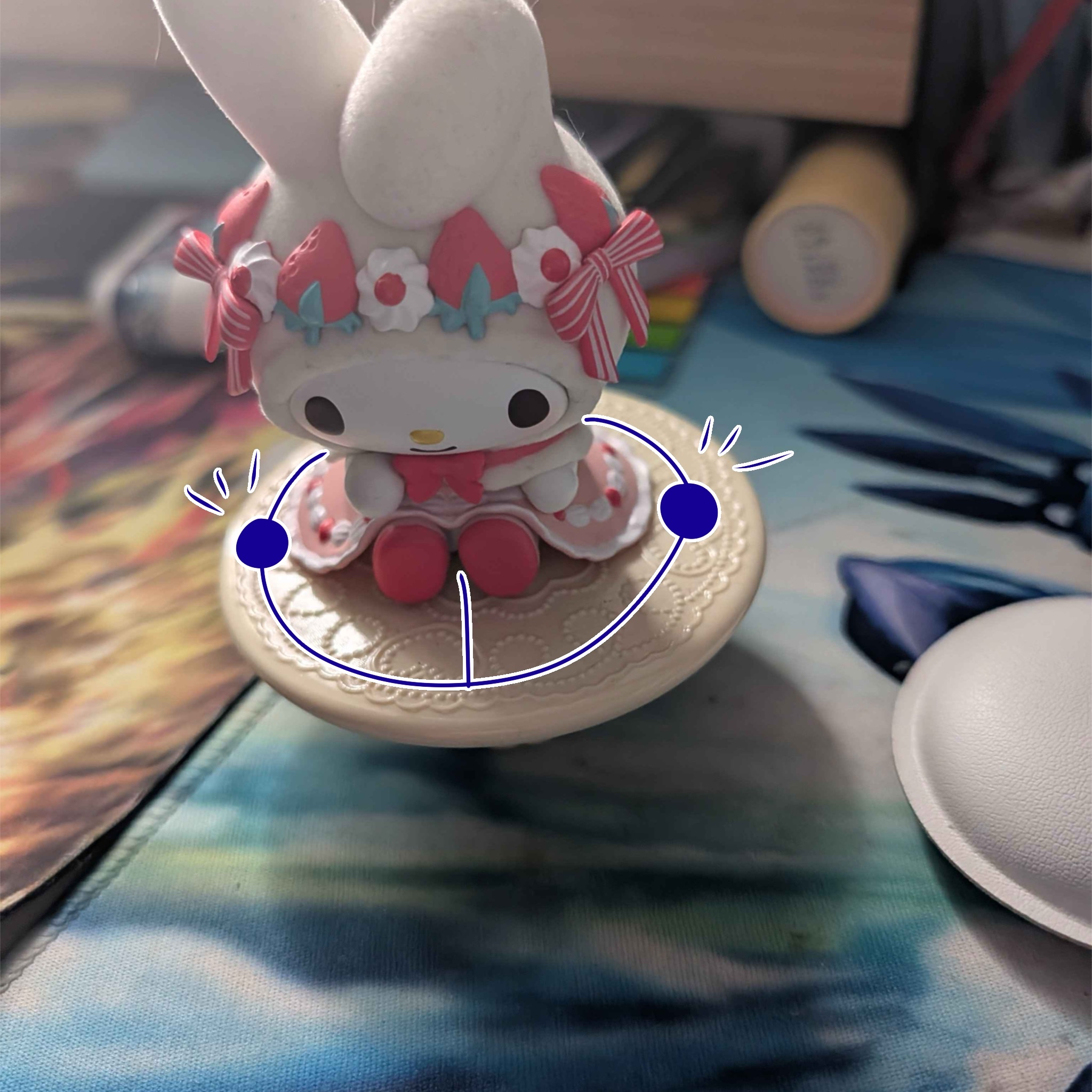 Upwards angle of the figurine with the circut design.